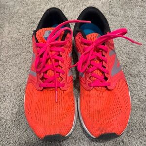New Balance running shoes. WZANTVC4.size 10. Neon orange, pink and black.